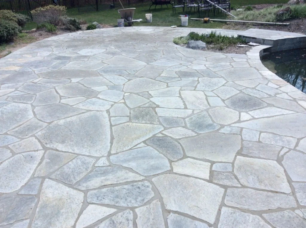 Flagstone Patio Mortar vs Sand: Structural Considerations