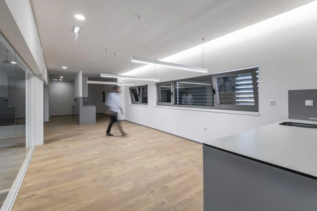 Lighting strategies to enhance a neutral workspace