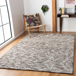 Understanding the Appeal of living room décor with textured rugs
