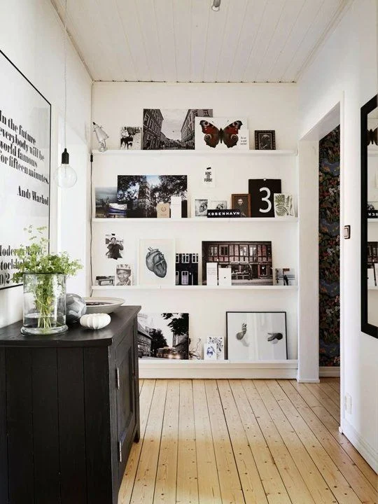 Why Small Wall Décor Using Picture Ledges Works So Well