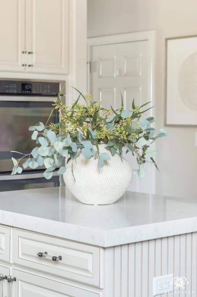 Styling the bowls on countertops and islands in kitchen décor with neutral ceramic bowls